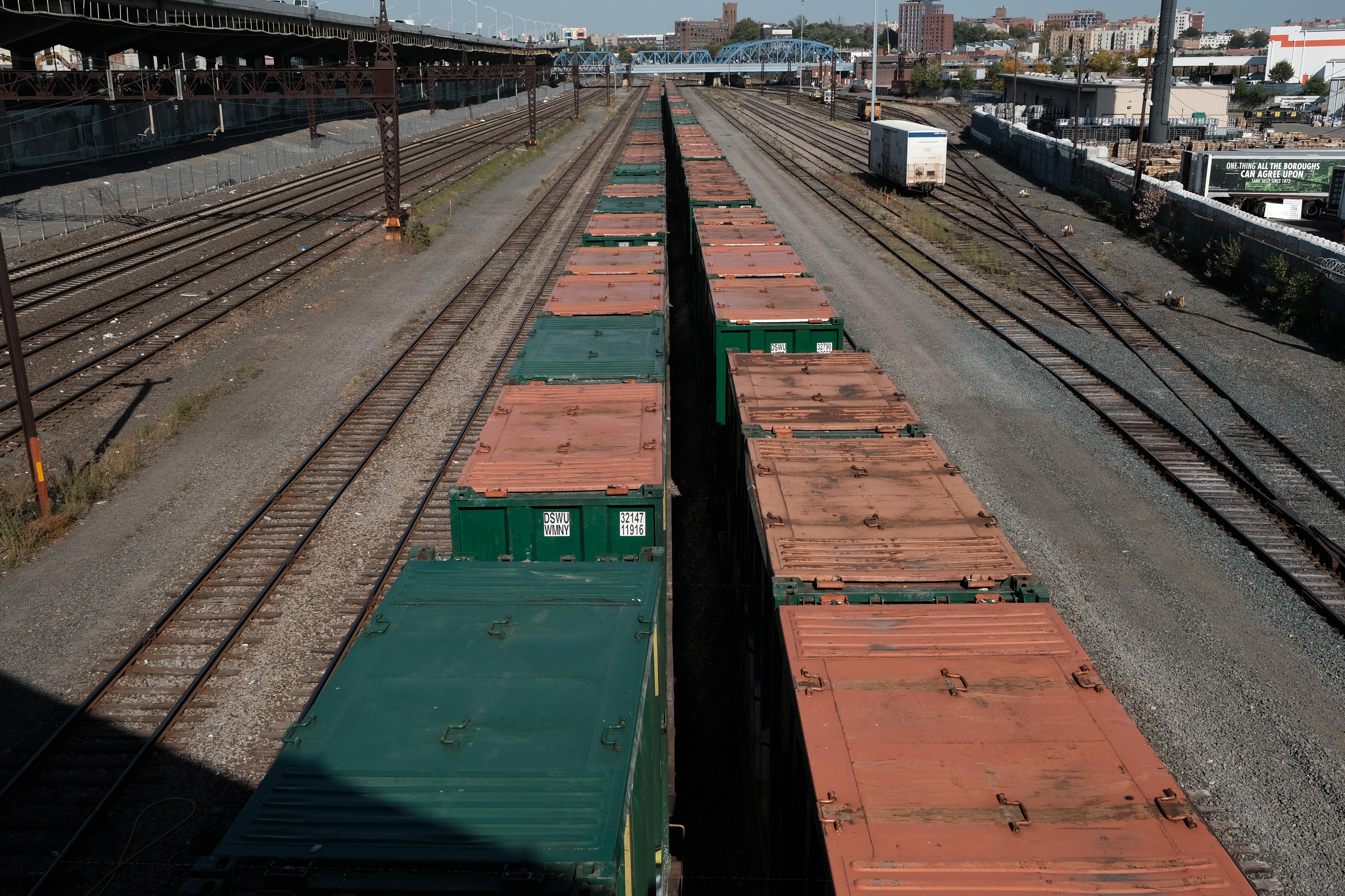 Trains sit at the CSX Oak Point Yard, a freight railroad yard on October 11, 2022 in the Bronx borough of New York City. The country's largest railroad unions announced that they have rejected its deal with freight railroads. The union has said the deal doesn't do enough to address the lack of paid sick time or improve working conditions. (Photo by Spencer Platt/Getty Images)