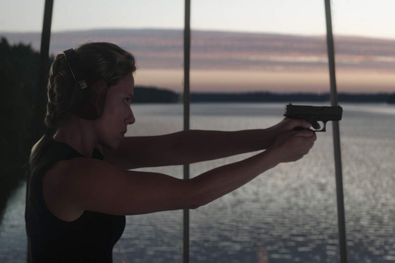 Scarlett Johansson aiming a pistol in a still from Avengers: Endgame.
