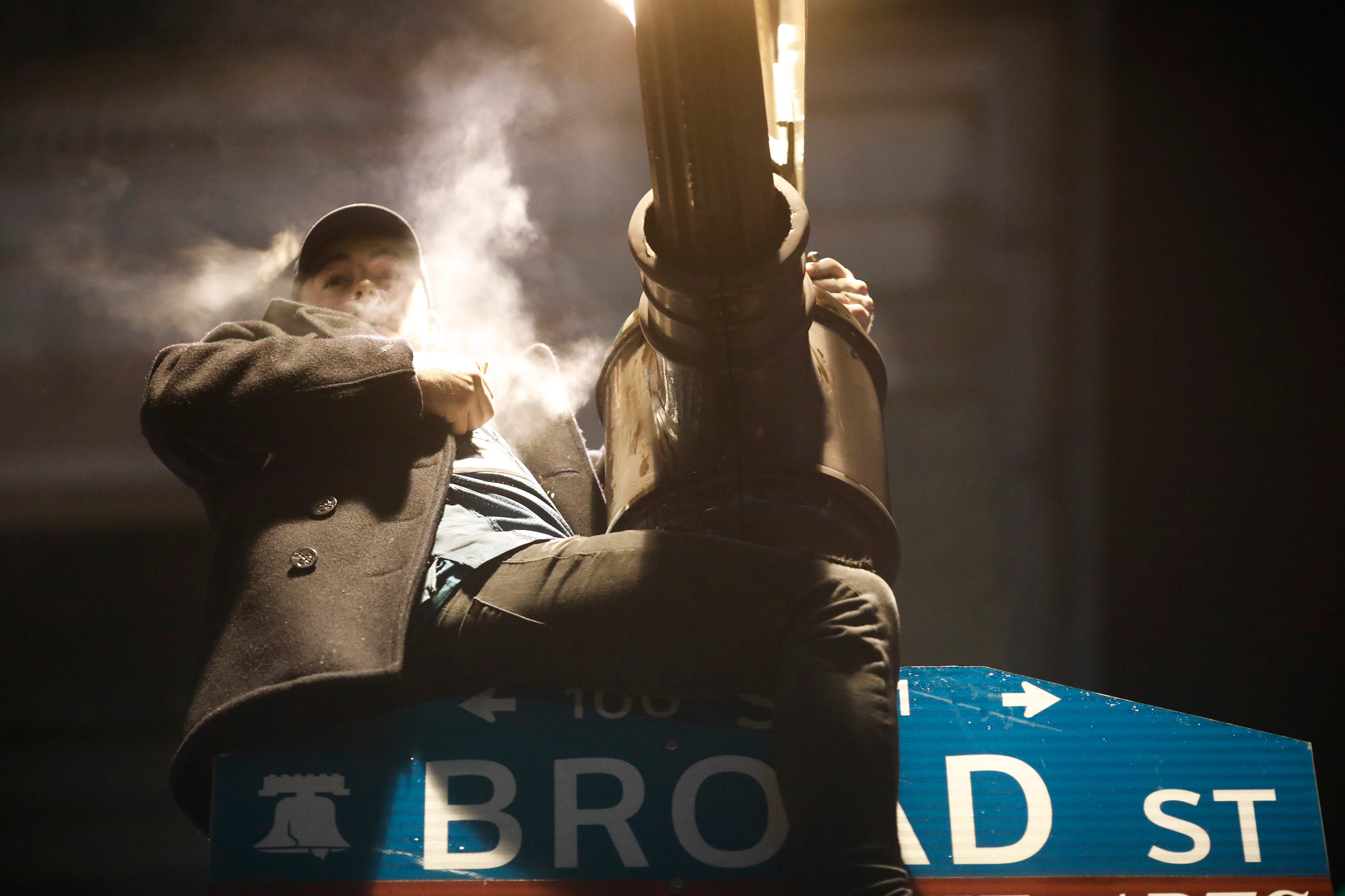 A fan celebrates in Center City after the Philadelphia Eagles defeated the New England Patriots to win the Super Bowl on February 4, 2018 in Philadelphia, Pennsylvania.
