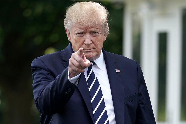President Trump points as he walks out of the White House before departing July 19, 2019 in Washington, DC.