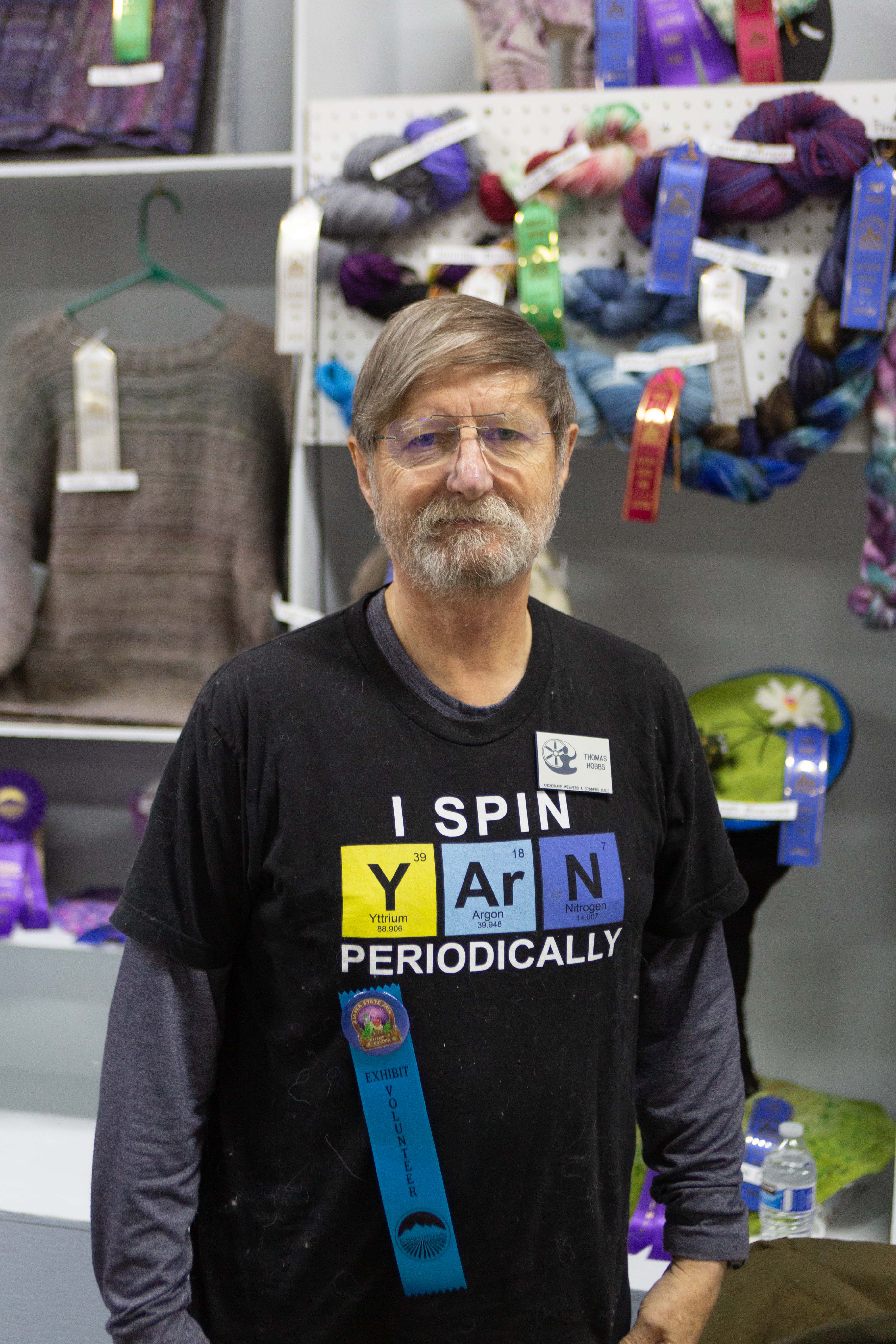Man with “I Spin Yarn Periodically” shirt