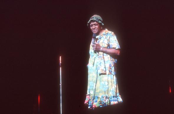 Moms Mabley on stage.