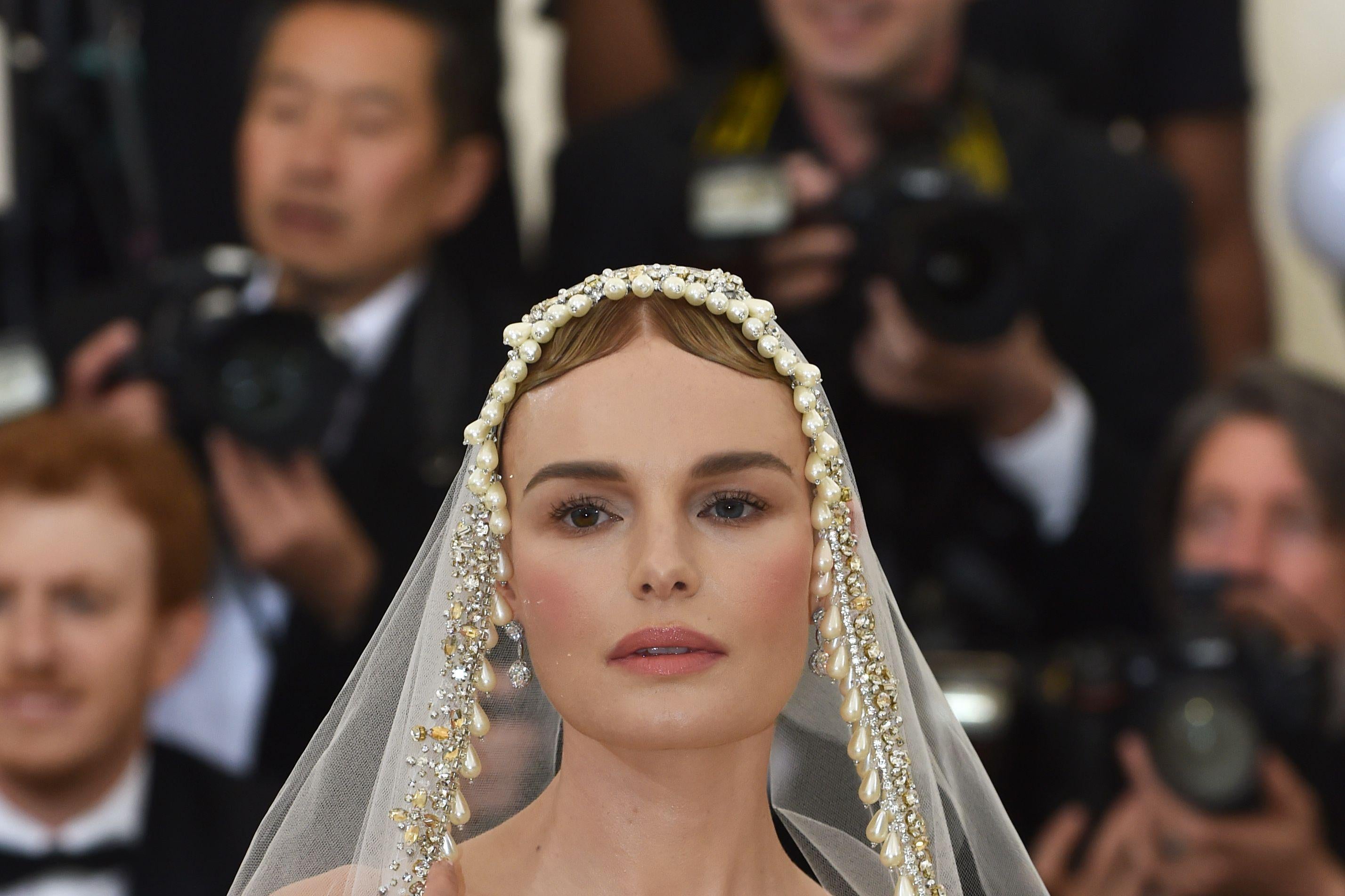 Kate Bosworth arrives for the 2018 Met Gala on May 7, 2018, at the Metropolitan Museum of Art in New York. - The Gala raises money for the Metropolitan Museum of Arts Costume Institute. The Gala's 2018 theme is Heavenly Bodies: Fashion and the Catholic Imagination. (Photo by Hector RETAMAL / AFP) (Photo credit should read HECTOR RETAMAL/AFP/Getty Images)