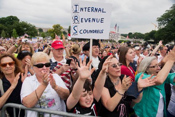 The crowd cheers for Rep. Michele Bachmann, R-Minn., during a Tea Party Patriots rally on the west front of the Capitol to protest the IRS's targeting of conservative political groups.