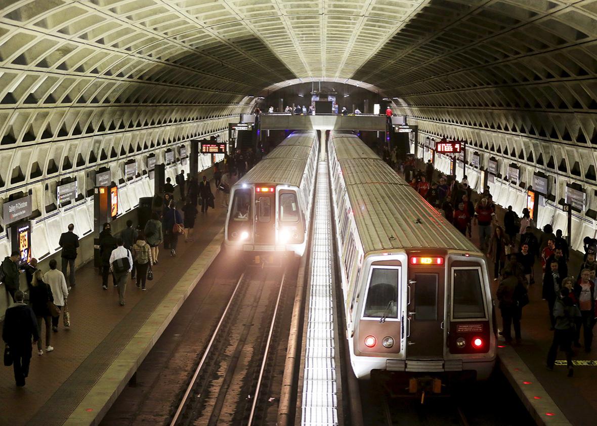 Metro trains arrive in the Gallery Place-Chinatown station ahead of a 29-hour shutdown for an emergency safety investigation of power cabling of the entire Washington Metro system in Washington March 15, 2016. 