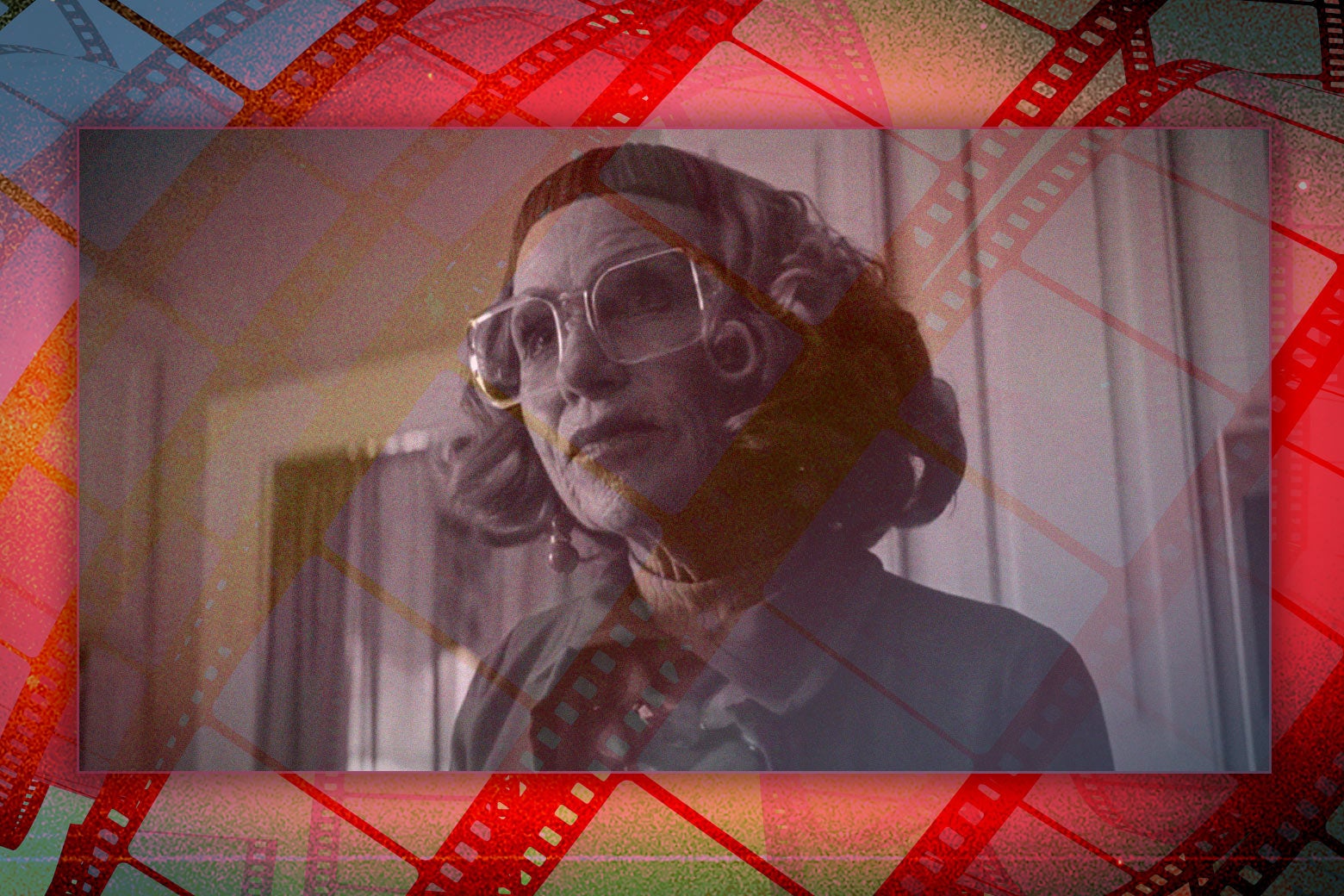 An elderly woman with large glasses staring judgingly.