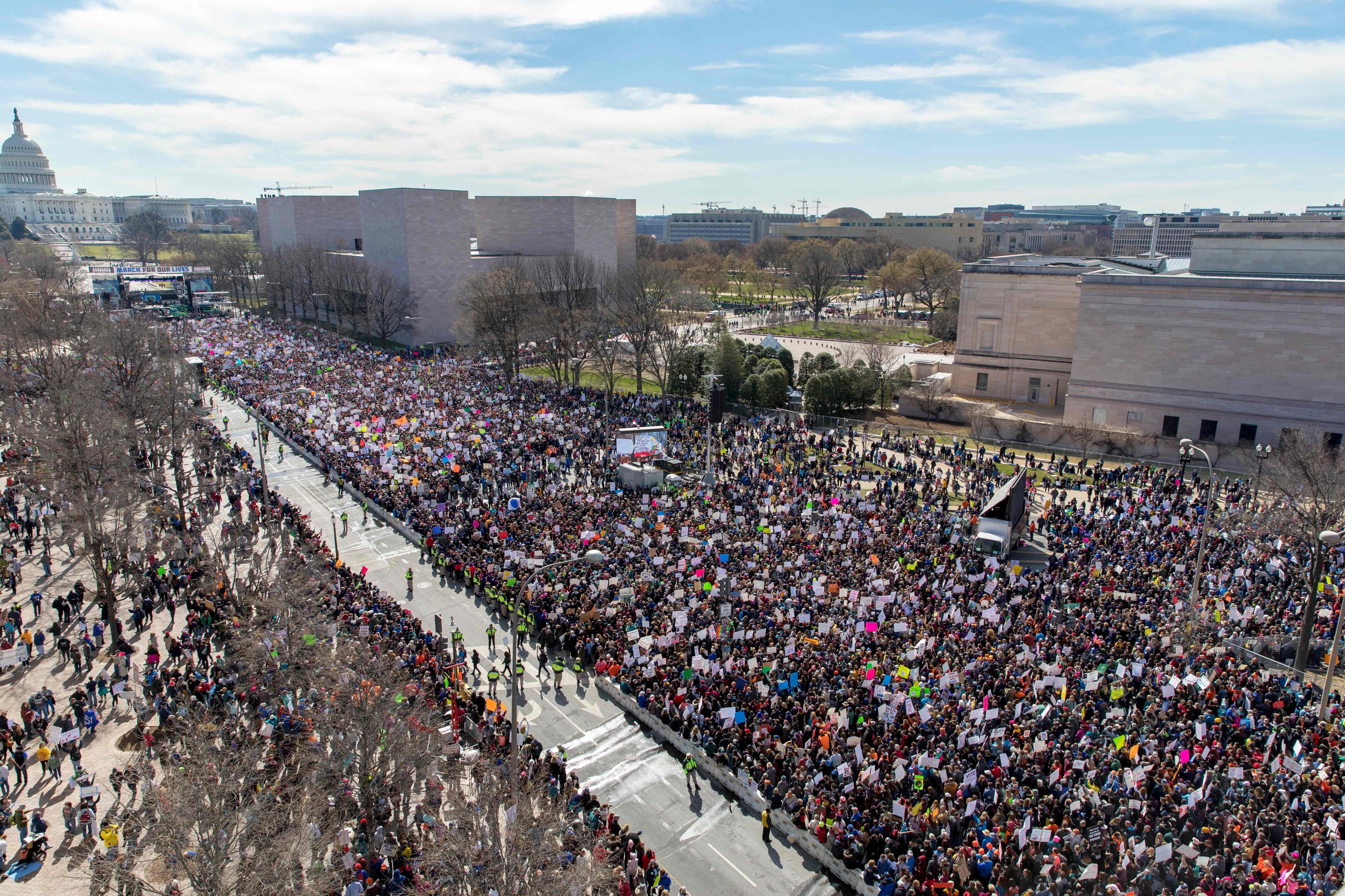 The crowd at the March for Our Lives Rally as seen from the roof of the Newseum in Washington, DC on March 24, 2018. Galvanized by a massacre at a Florida high school, hundreds of thousands of Americans are expected to take to the streets in cities across the United States on Saturday in the biggest protest for gun control in a generation.