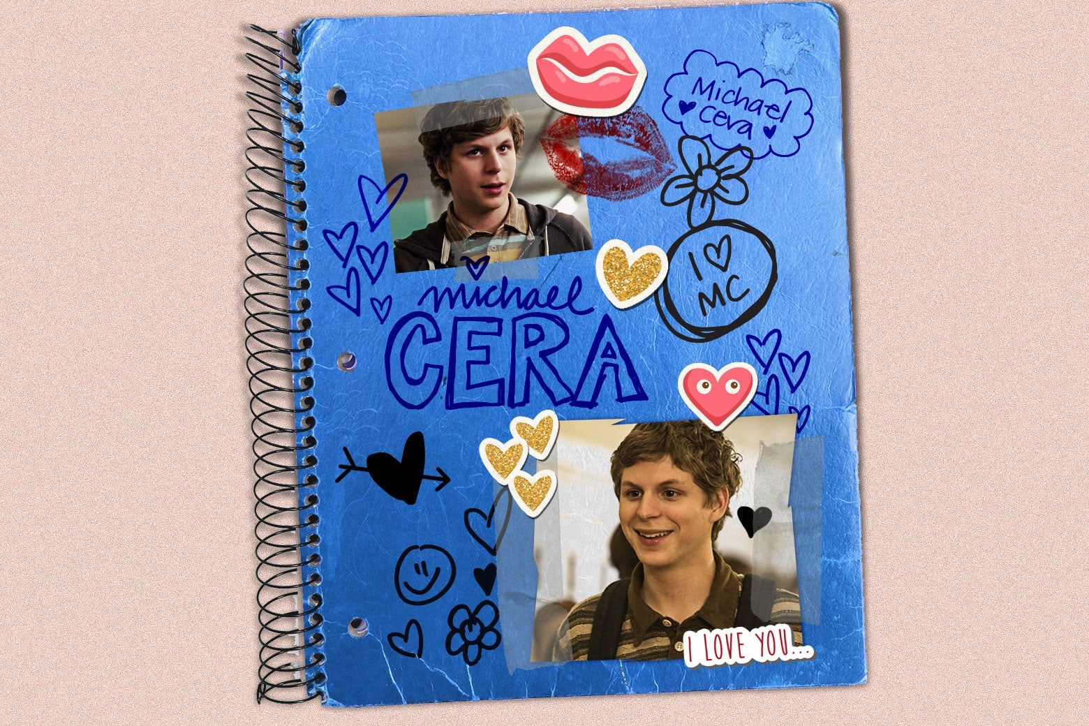 A blue spiral notebook covered with pictures of Michael Cera, stickers, and doodles.