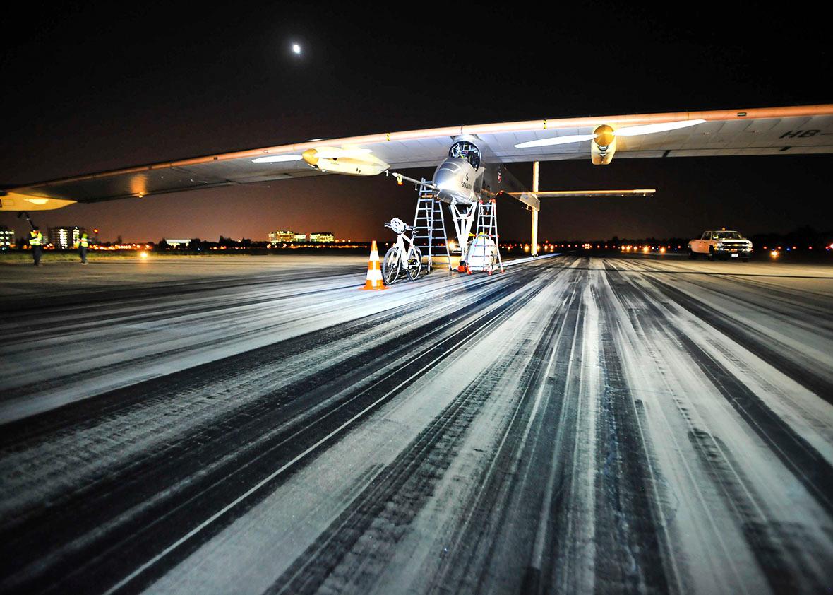 The Solar Impulse plane sits on the tarmac at Moffett Field NASA,The Solar Impulse plane sits on the tarmac at Moffett Field NASA Ames Research Center in Mountain View, California.