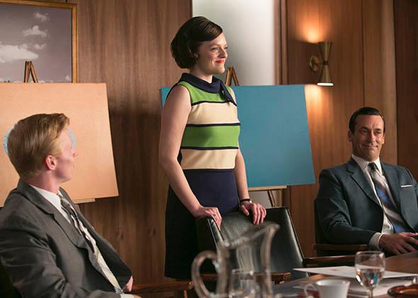Elisabeth Moss as Peggy Olson and Jon Hamm as Don Draper in Mad Men.