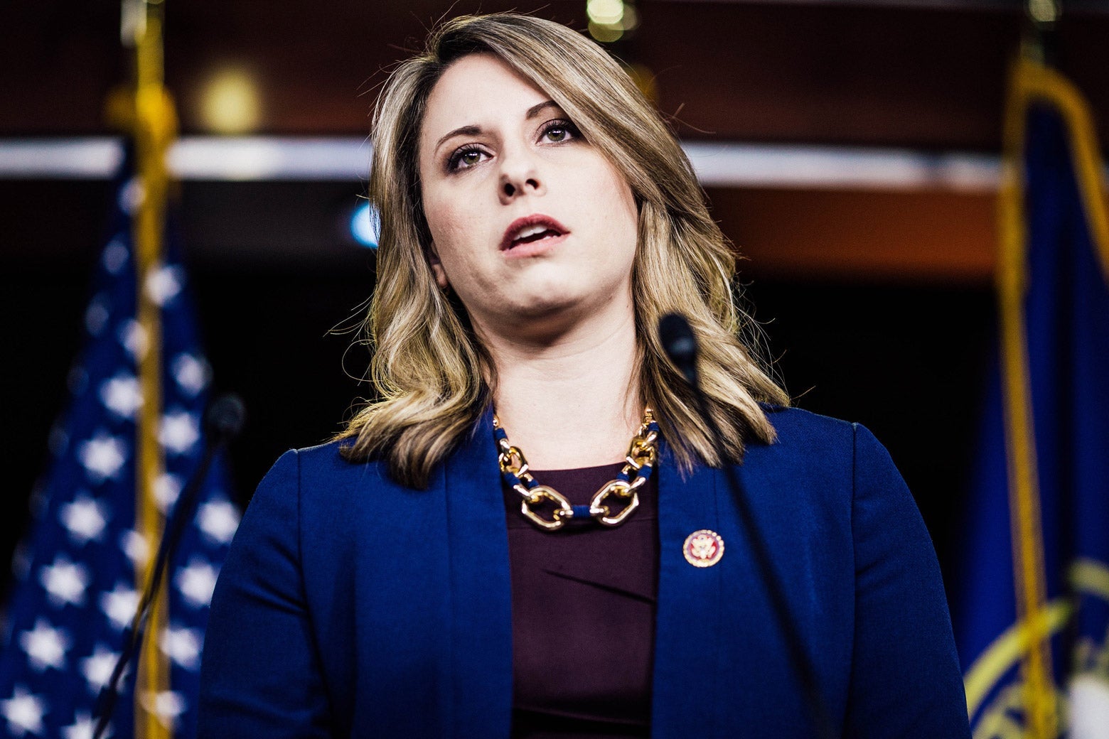 Then-Rep. Katie Hill is caught mid-word during a news conference demanding the production of documents related to Americans health care in the Texas v. United States lawsuit.