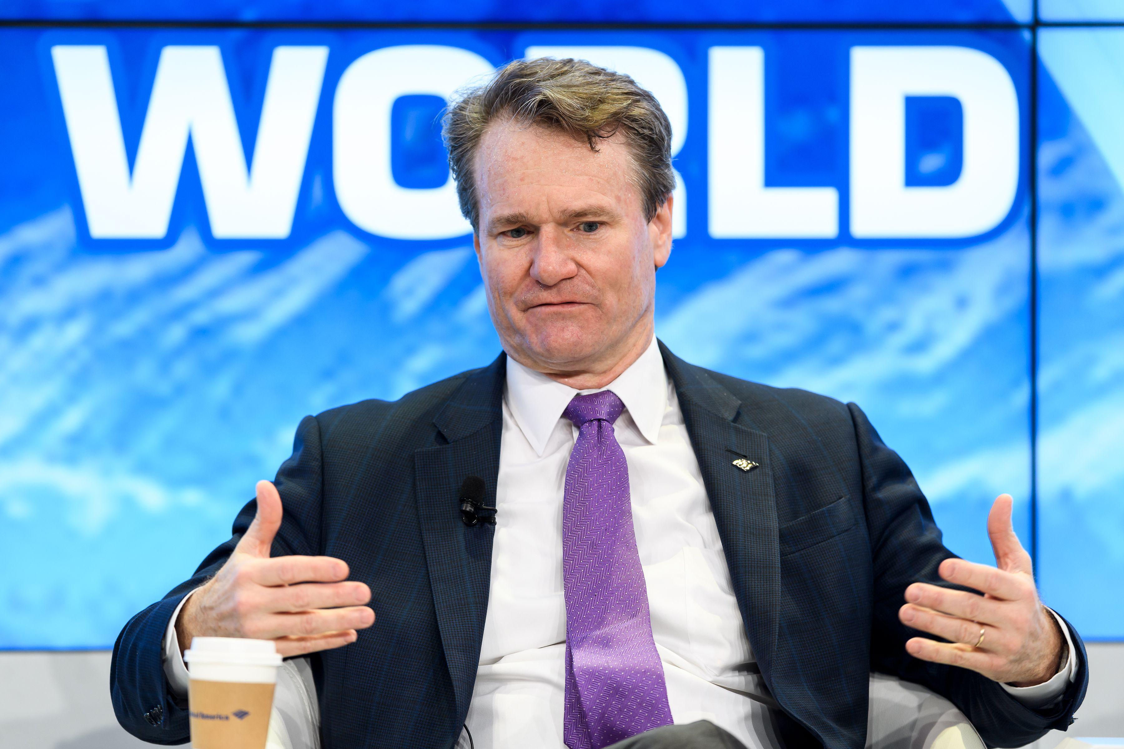 Bank of America Chaiman and CEO Brian Moynihan gestures while speaking during a session on the opening day of the World Economic Forum (WEF) 2018 annual meeting, on January 23, 2018 in Davos, eastern Switzerland. / AFP PHOTO / Fabrice COFFRINI        (Photo credit should read FABRICE COFFRINI/AFP/Getty Images)