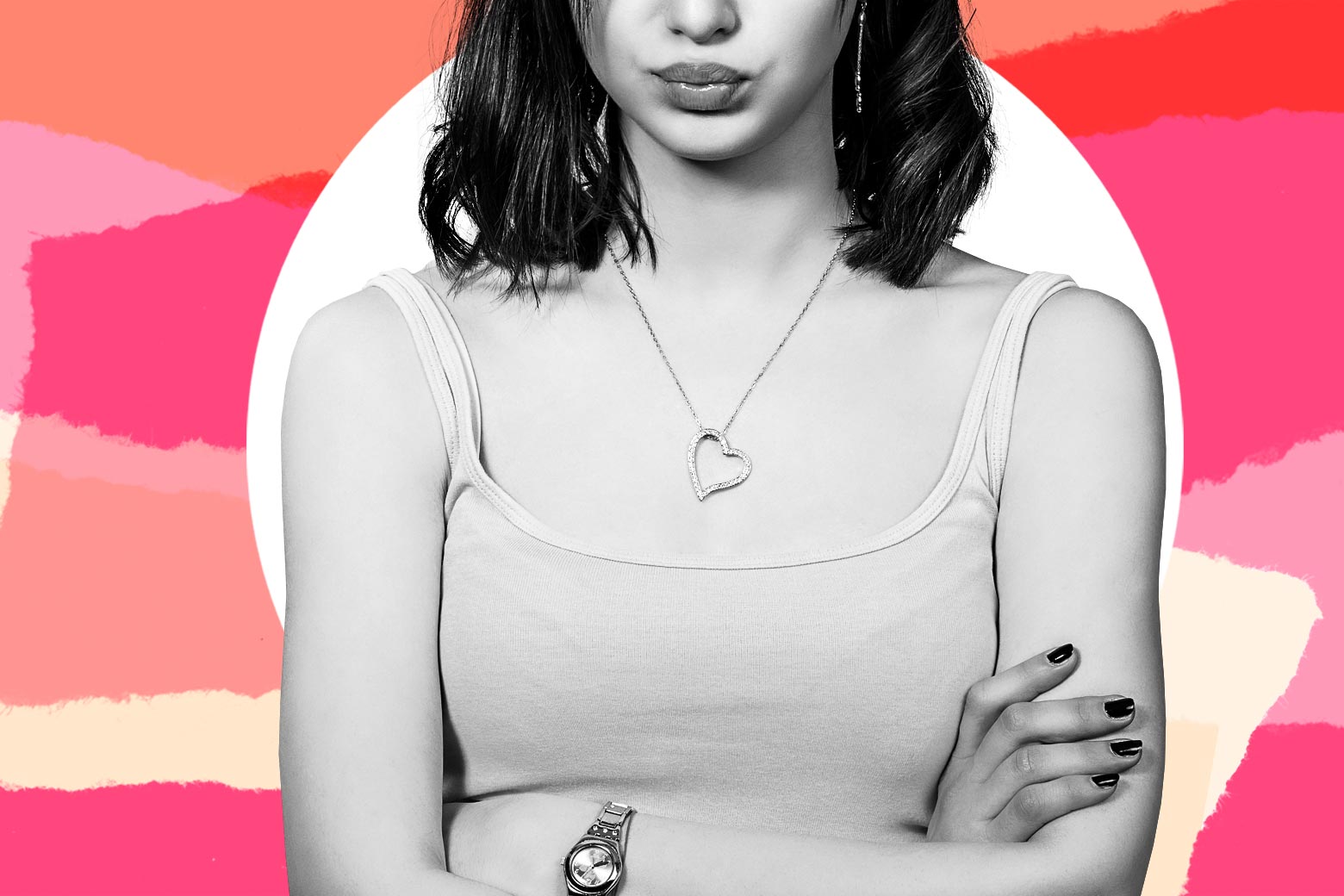 A tween folds her arms across her chest and purses her lips.