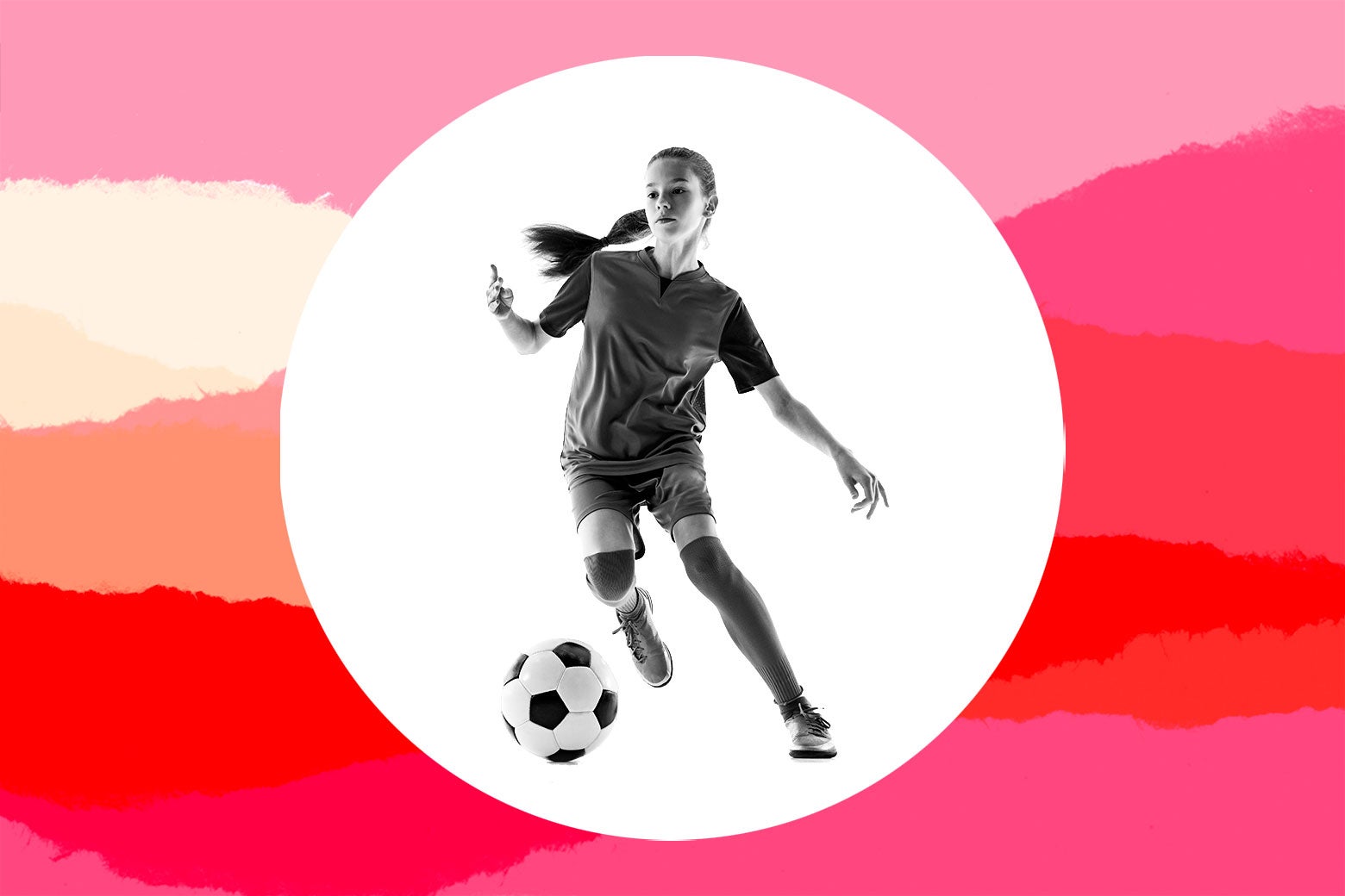 Young girl playing soccer.