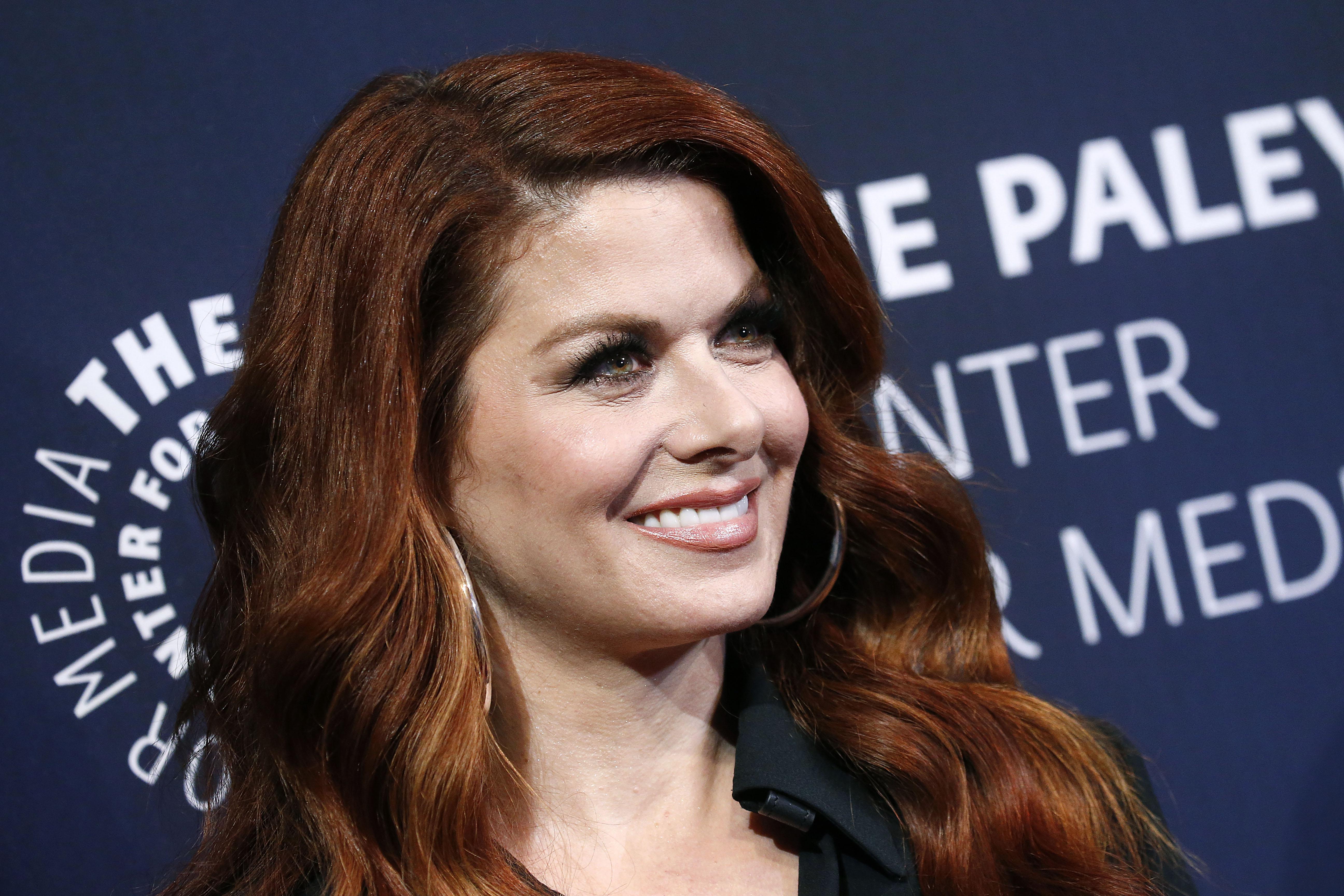 Debra Messing on a Paley Center red carpet.