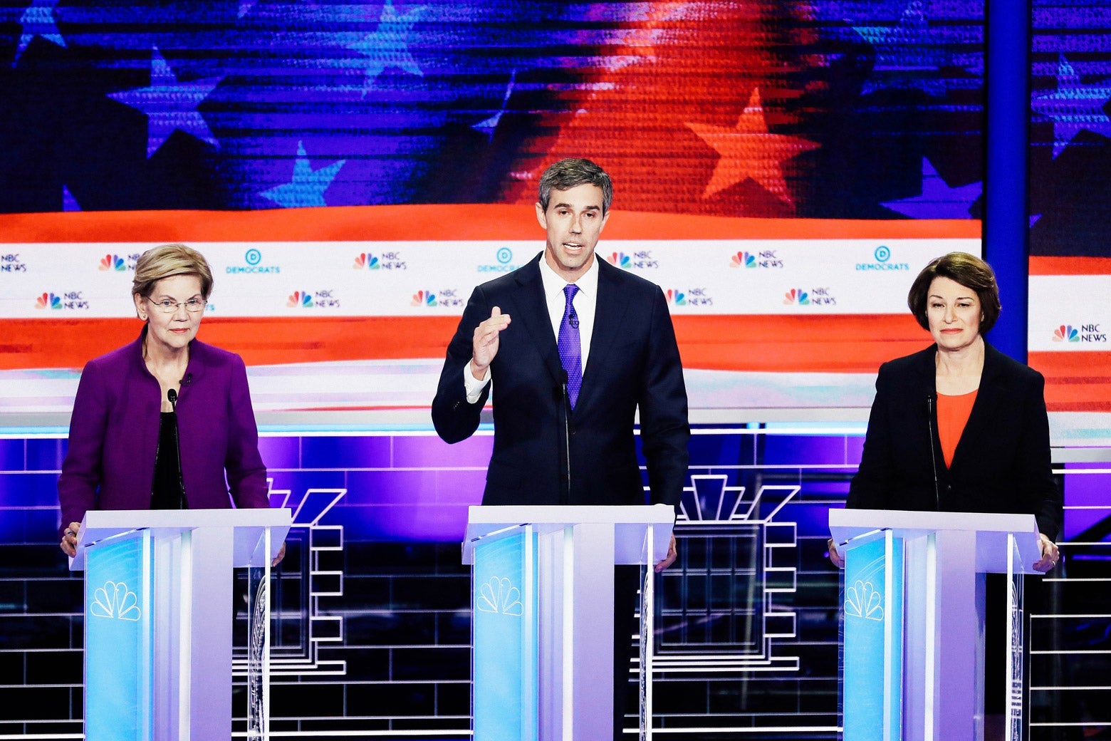 Elizabeth Warren, Beto O'Rourke, and Amy Klobuchar on the debate stage.