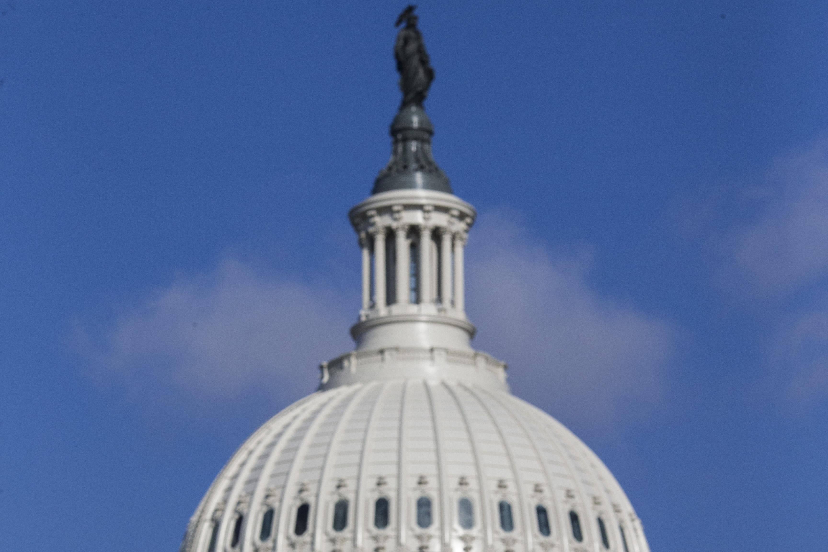 100 life-sized cutouts of Facebook CEO Mark Zuckerberg sit on the lawn of the U.S. Capitol ahead of Zuckerberg's hearing before the Senate Commerce, Science, and Transportation and Senate Judiciary Comittees. 