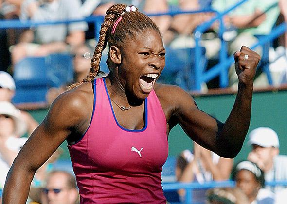 Serena Williams celebrates the next to last point in her final against Kim Clijsters at Indian Wells on March 17, 2001