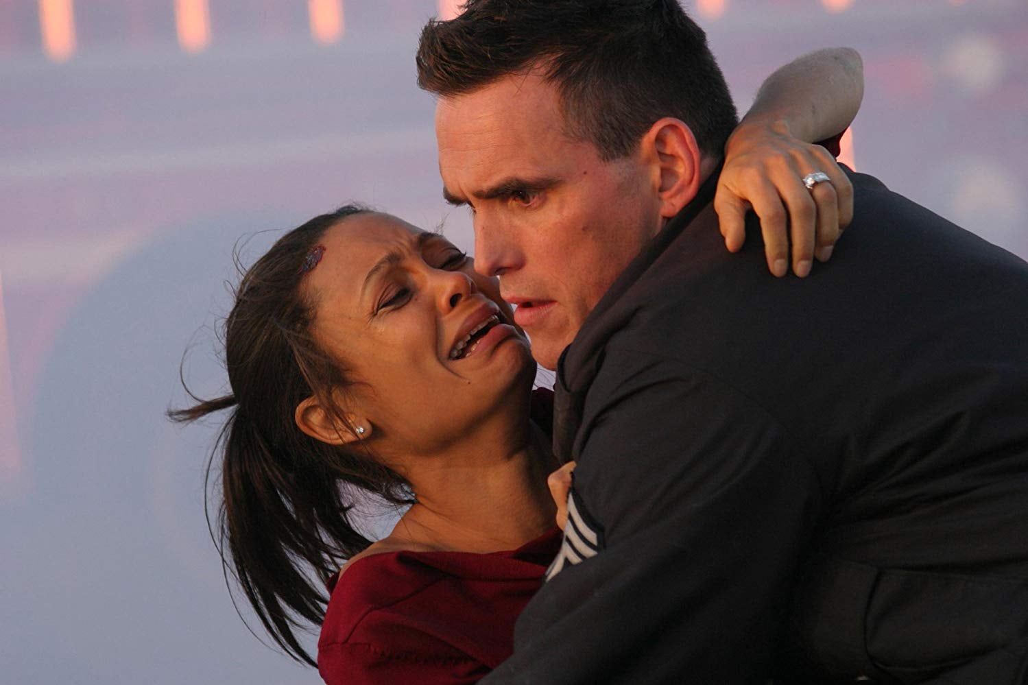 Thandie Newton sobs in Officer Matt Dillon’s arms in Crash.