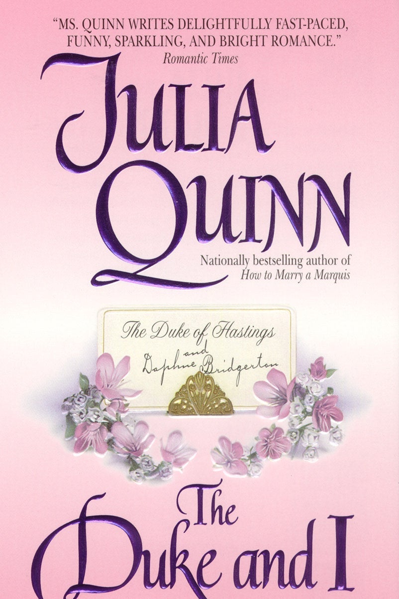 A pink book cover with a card on it reading "The Duke of Hastings" in elegant script with "and Daphne Bridgerton scrawled beneath it. The card is surrounded by dainty pink flower and large purple letters reading: "Julia Quinn" and "The Duke and I."    