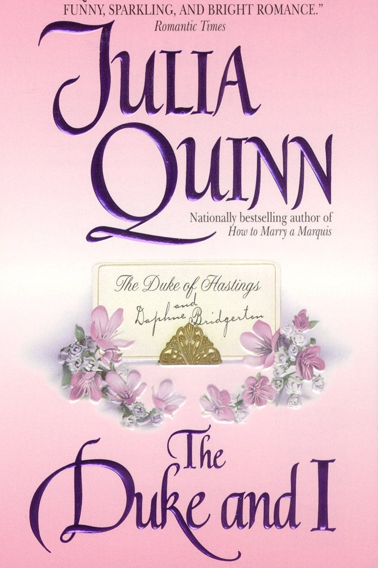 A pink book cover with a map on it reading "The Duke of Hastings" in elegant writing with "and Daphne Bridgerton doodled below.  The card is surrounded by a delicate pink flower and large purple letters stating: "Julia Quinn" and "The duke and me."    