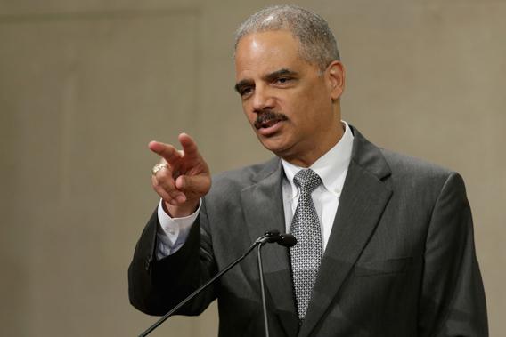  U.S. Attorney General Eric Holder delivers remarks during the Justice Department Inspector General's annual awards ceremony in the Great Hall at the Robert F. Kennedy Department of Justice building May 29, 2013 in Washington, DC.