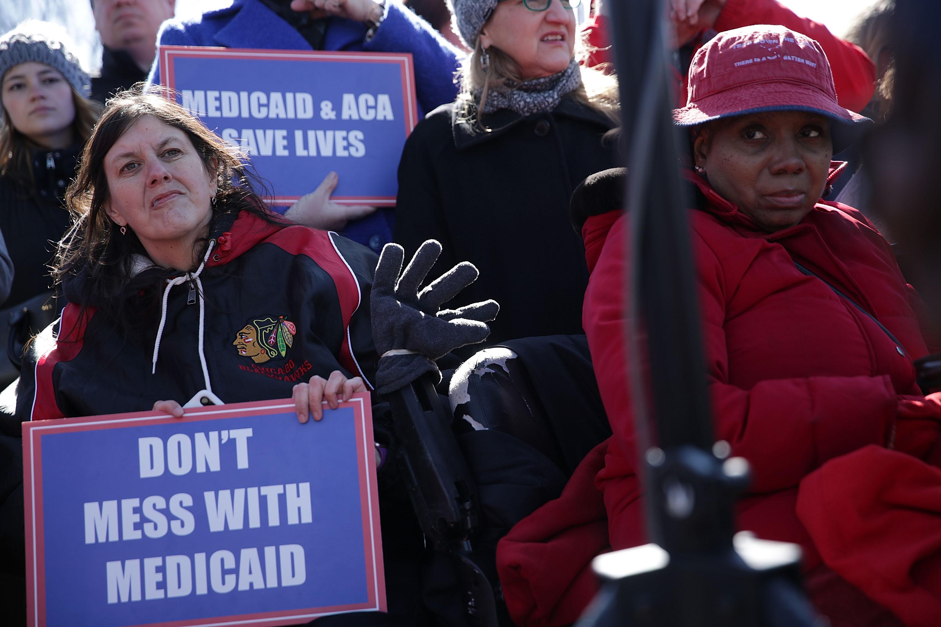 WASHINGTON, DC - MARCH 22:  Health care activists participate in a rally in front of the Capitol March 22, 2017 on Capitol Hill in Washington, DC. Senate Democrats held the rally to highlight changes being sought in Medicaid in the Republican American Health Care Act.  (Photo by Alex Wong/Getty Images)