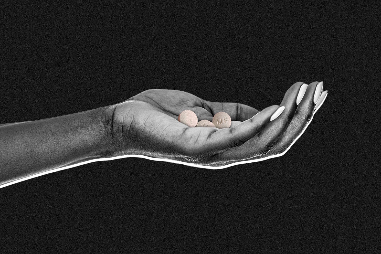 A hand holding out a mifepristone pill.