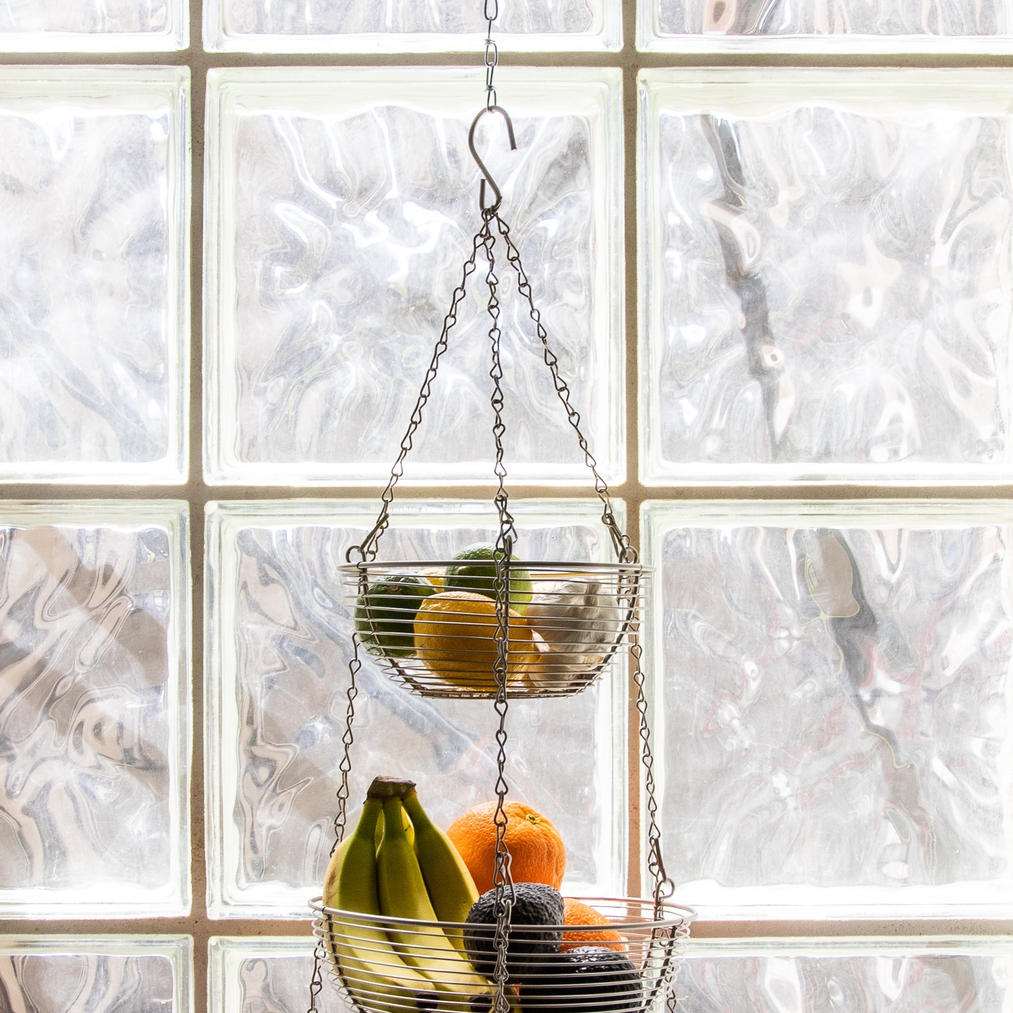 Sur la Table’s Three-Tier Hanging Basket filled with fruit