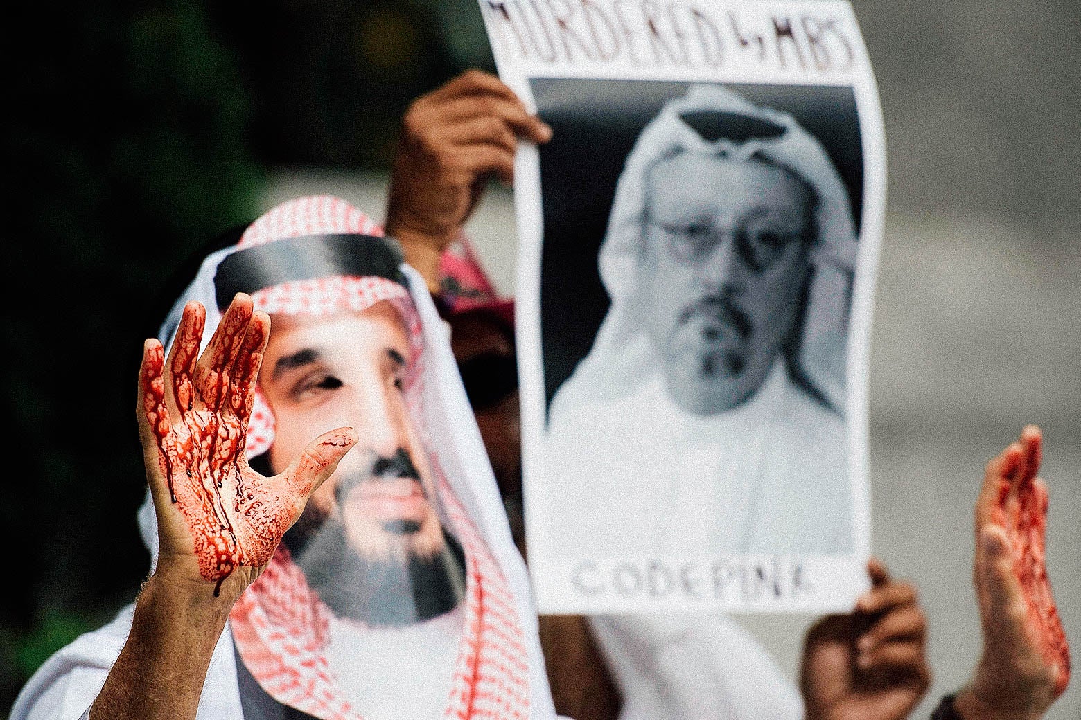 A demonstrator dressed as Saudi Arabian Crown Prince Mohammed Bin Salman with blood on his hands protests outside the Saudi Embassy in D.C.