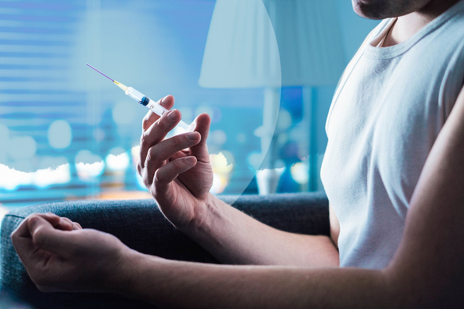 Man about to inject drugs with a syringe. Photo illustration by Slate. Photo by Thinkstock.