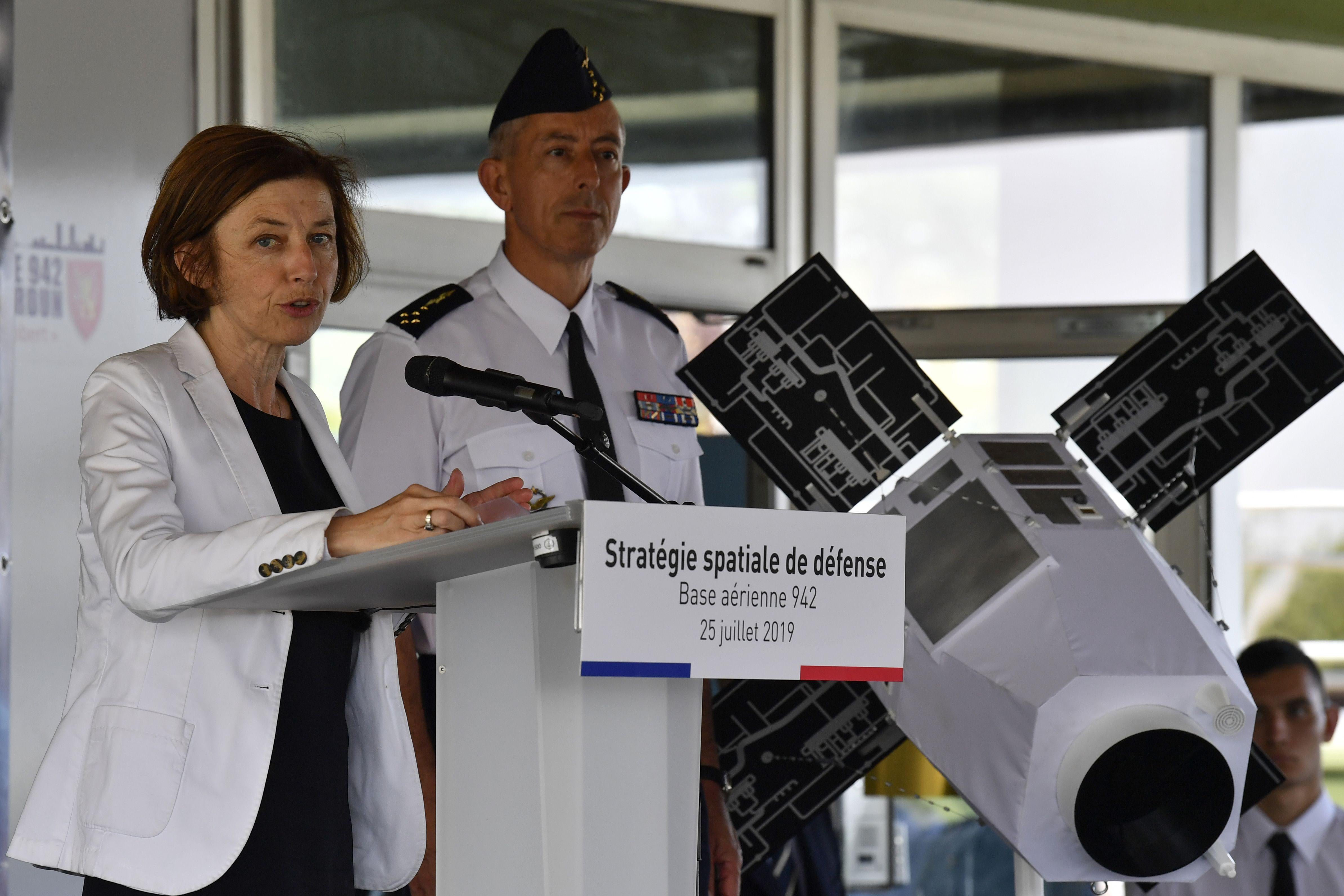 French Minister of Defence Florence Parly (L), addresses a speech next to the Air Force general Philippe Lavigne (C) to present the new Defence space Strategy on July 25, 2019 at the Command of Air Defence and Air Operations (Commandement de la defense aerienne et des operations aeriennes - CDAOA) in the base 942 on the Verdun mount in Poleymieux-au-Mont-d'Or near Lyon, eastern France. (Photo by PHILIPPE DESMAZES / AFP)        (Photo credit should read PHILIPPE DESMAZES/AFP/Getty Images)