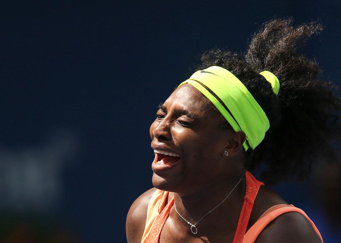 Serena Williams of the United States returns a shot to Roberta V