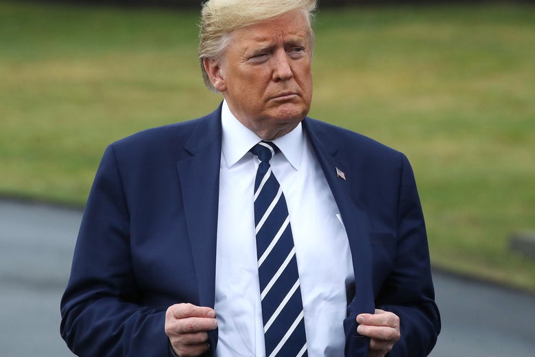 Trump gripping the lapels of his jacket cartoonishly.
