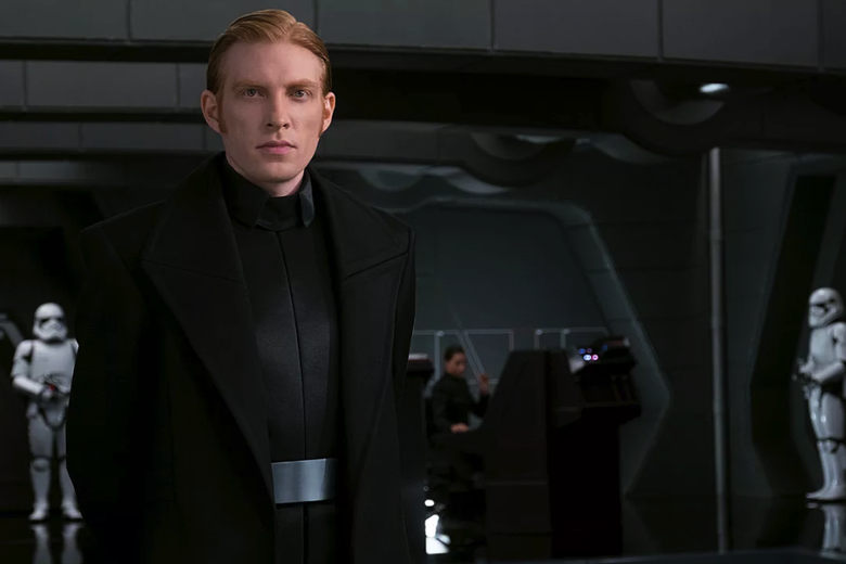 General Hux stands on the bridge of his star destroyer.
