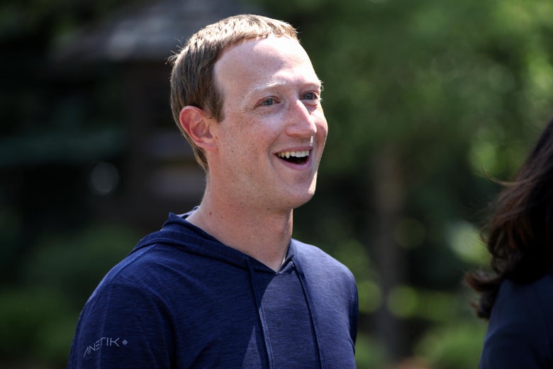 Zuckerberg in a hoodie smiling outdoors in Idaho in July.