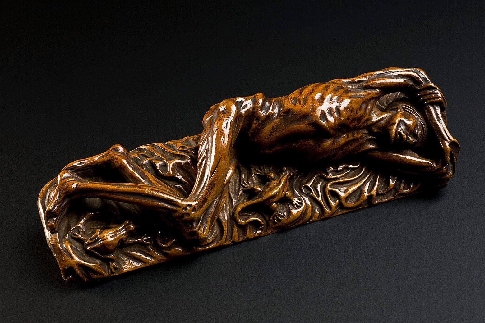 Wooden statue depicting a plague sufferer, Europe, sometime in the 1600s.