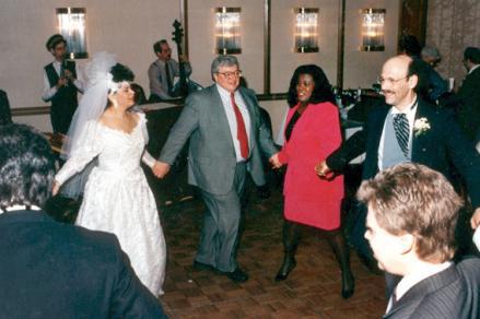 The Eberts dancing at the wedding of a couple who met in his ongoing adult-education film class.