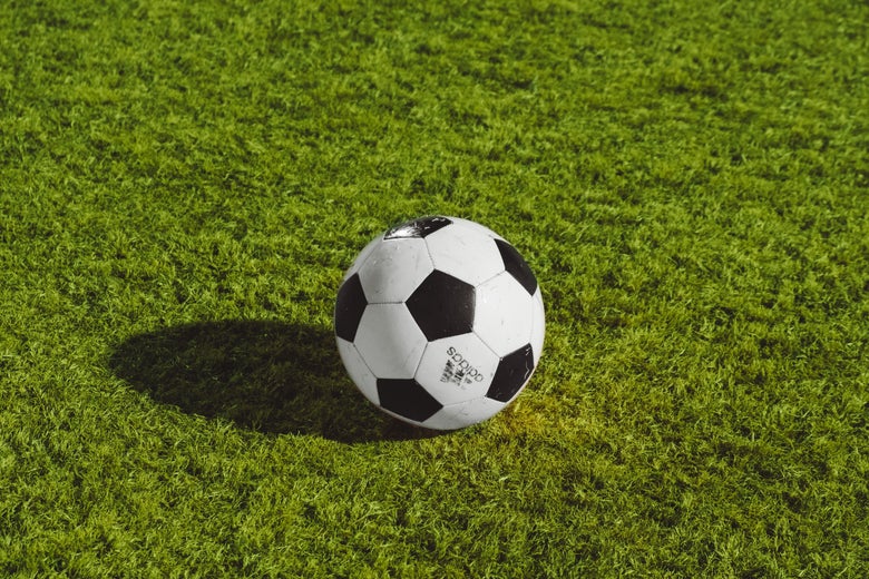 A soccer ball on a field.