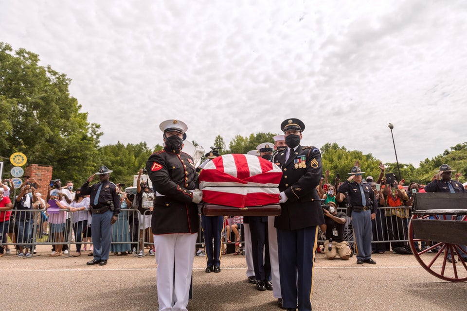 John Lewis makes final crossing of Edmund Pettus Bridge.
