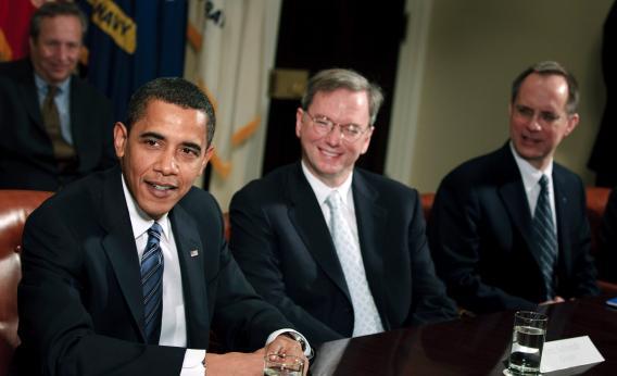 Barack Obama speaks in the Roosevelt Room of the White House as Eric Schmidt, CEO of Google, and David Barger, CEO of JetBlue, listen Jan. 28, 2009, in Washington D.C.