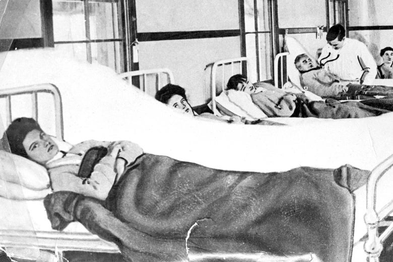Mary Mallon and other patients in hospital beds.