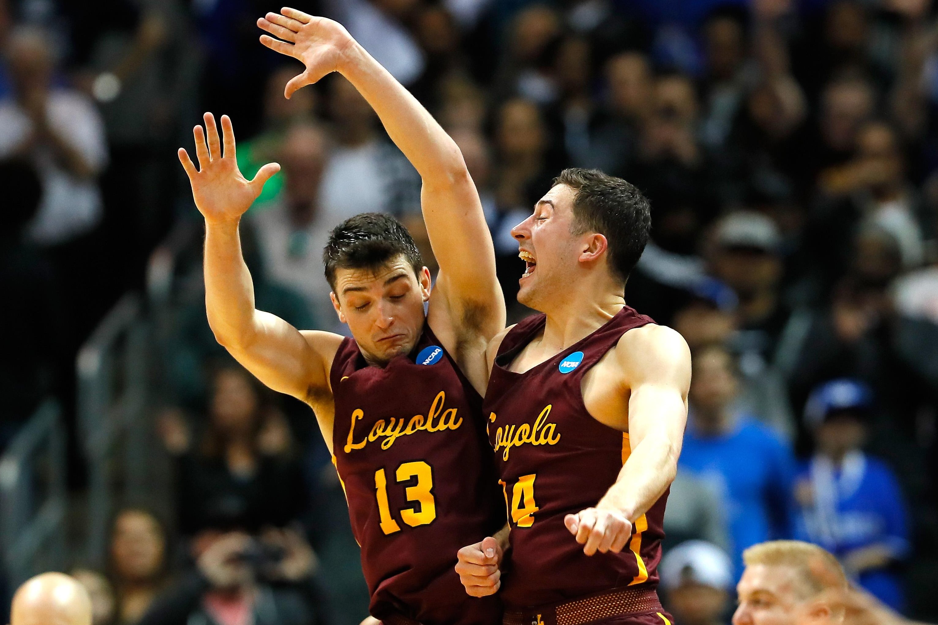 ATLANTA, GA - MARCH 22: Clayton Custer #13 and Ben Richardson #14 of the Loyola Ramblers celebrate after defeating the Nevada Wolf Pack during the 2018 NCAA Men's Basketball Tournament South Regional at Philips Arena on March 22, 2018 in Atlanta, Georgia.  (Photo by Kevin C. Cox/Getty Images)