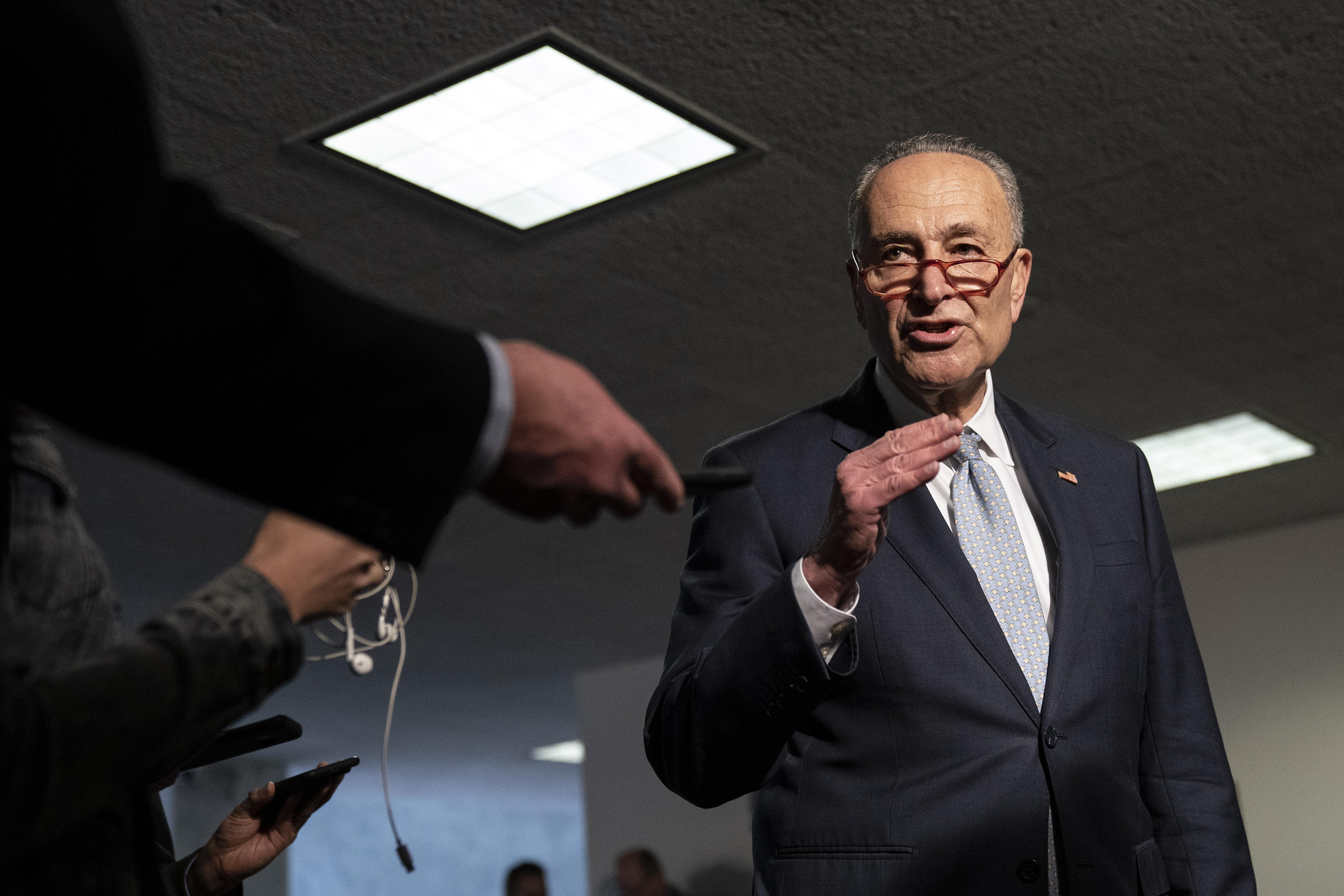 Chuck Schumer speaks to reporters in D.C. on Friday.