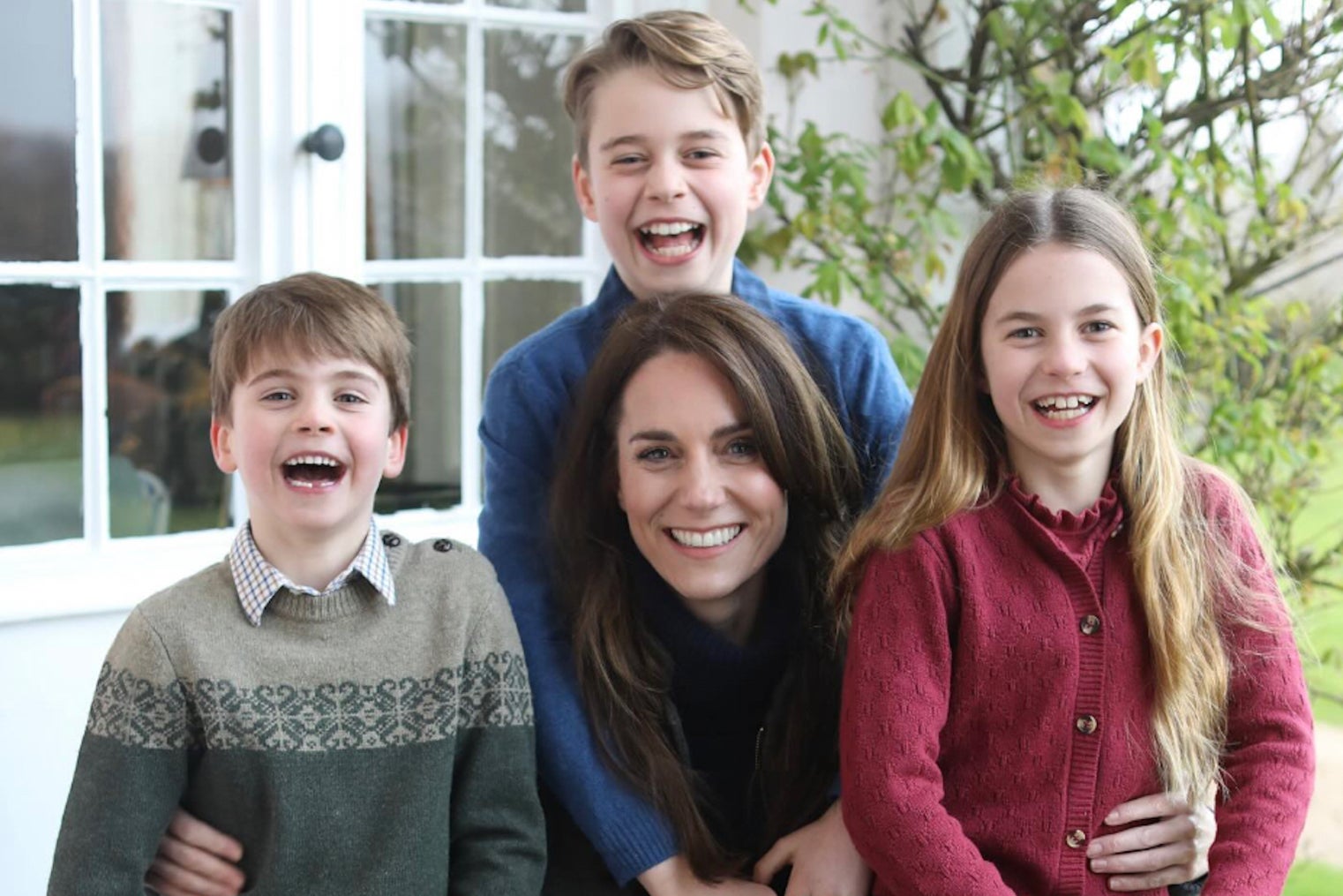 The offending photo of Kate and her three kids, an image that many say has been manipulated.