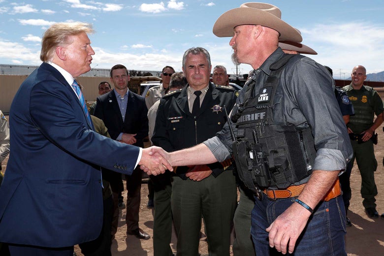 Donald Trump shakes Mark Lamb’s hand.