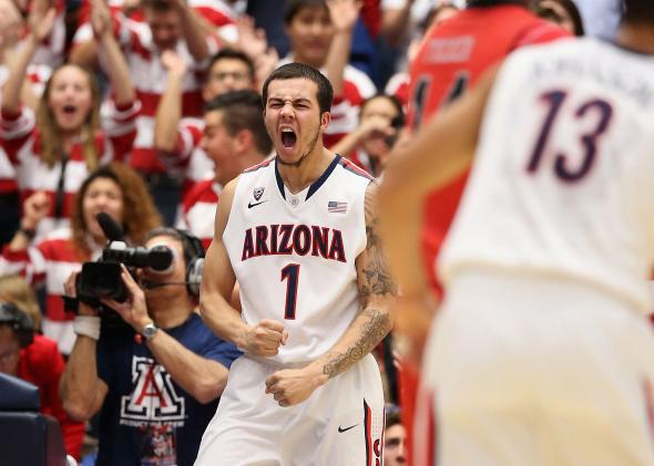 Gabe York #1 of the Arizona Wildcats celebrates after scoring against the Utah Utes during the first half of the college basketball game at McKale Center on January 26, 2014 in Tucson, Arizona. 