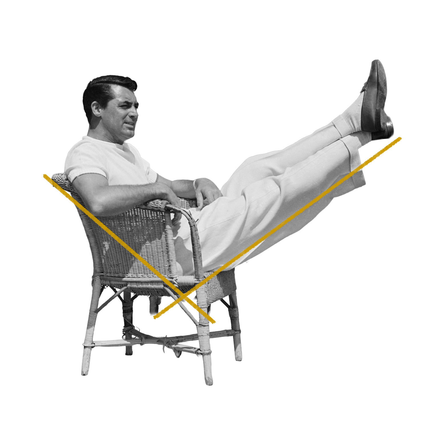 Cary Grant leans back in a chair with his feet up.