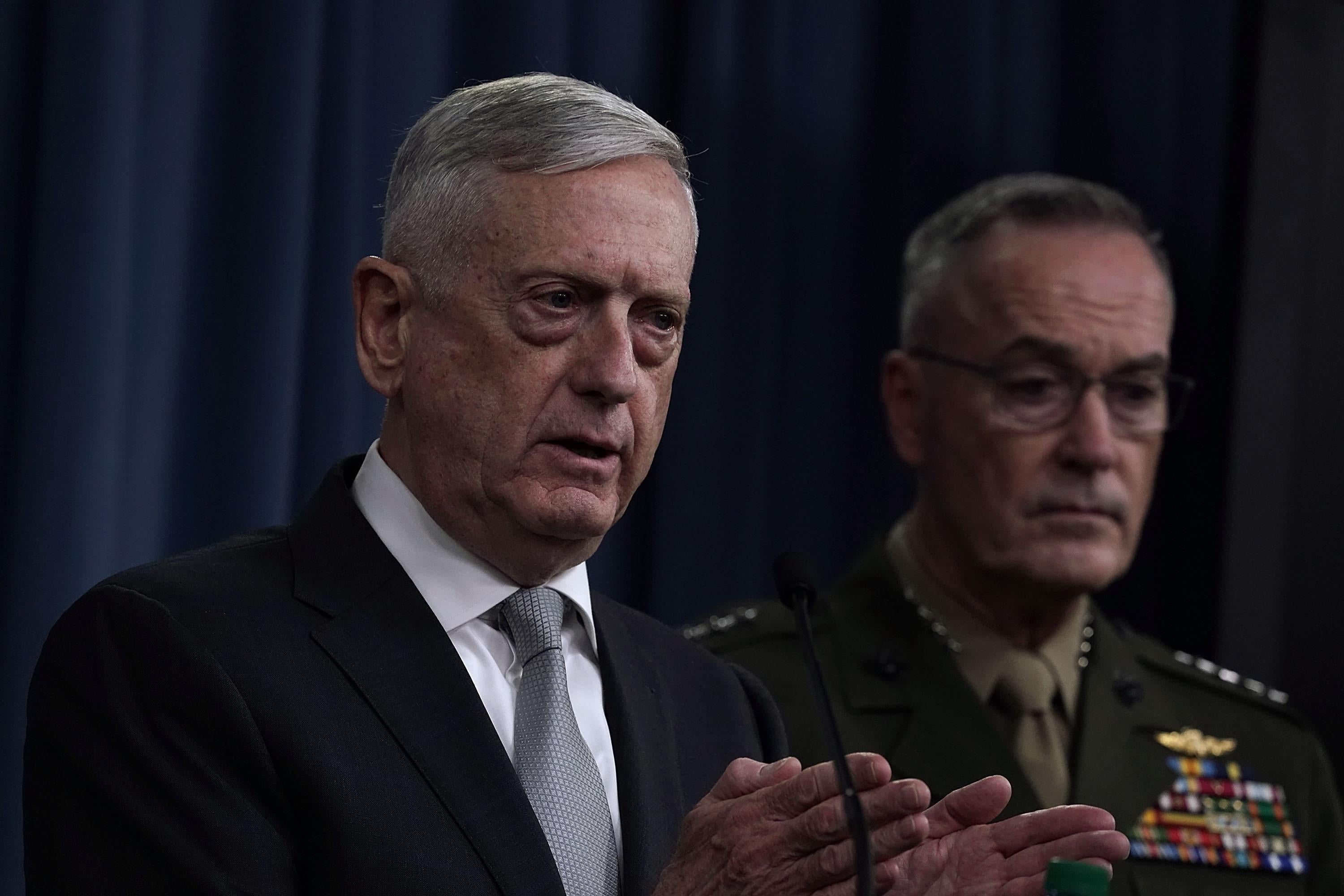 ARLINGTON, VA - APRIL 13:  U.S. U.S. Defense Secretary Jim Mattis (L) and Chairman of the Joint Chiefs of Staff Gen. Joseph Dunford (R) brief members of the media on Syria at the Pentagon April 13, 2018 in Arlington, Virginia. President Donald Trump has ordered a joint force strike on Syria with Britain and France over the recent suspected chemical attack by Syrian President Bashar al-Assad.  (Photo by Alex Wong/Getty Images)