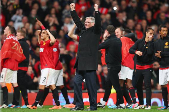 Sir Alex Ferguson, manager of Manchester United celebrates victory and winning the Premier League title after the Barclays Premier League match between Manchester United and Aston Villa at Old Trafford on April 22, 2013 in Manchester, England.